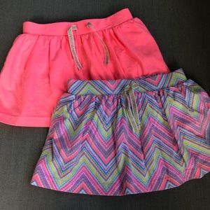 Never worn!  Two Osh Kosh skirts